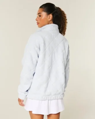 Sudadera con cremallera de un cuarto y bordado de lazo de Gilly Hicks