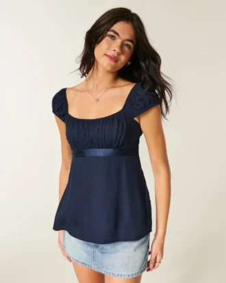 Top babydoll con lazo de satén