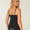 Top babydoll con tachuelas Top babydoll con tachuelas