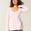 Top babydoll de manga larga con cuello Henley