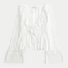 Top babydoll de manga larga con volantes Top babydoll de manga larga con volantes