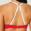 Top de bikini con aros, ribeteado y escote alto