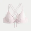 Top de bikini con aros, tirantes cruzados en la espalda y adornos de conchas Top de bikini con aros, tirantes cruzados en la espalda y adornos de conchas