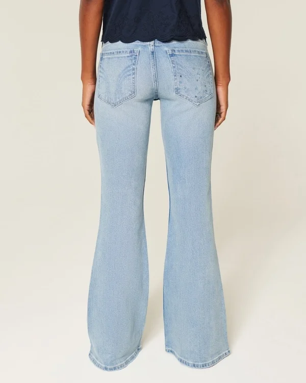 Vaqueros acampanados con lentejuelas, lavado claro y efecto desgastado, tiro ultrabajo Vaqueros acampanados con lentejuelas, lavado claro y efecto desgastado, tiro ultrabajo