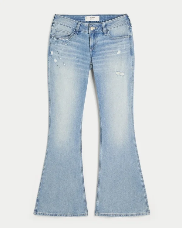 Vaqueros acampanados con lentejuelas, lavado claro y efecto desgastado, tiro ultrabajo Vaqueros acampanados con lentejuelas, lavado claro y efecto desgastado, tiro ultrabajo