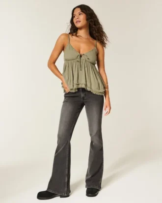 Vaqueros acampanados negros lavados de talle ultra bajo