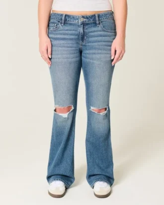 Vaqueros bootcut de talle bajo, lavado medio y rotos