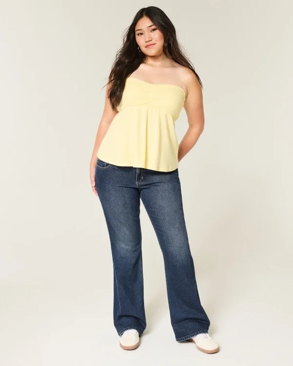 Vaqueros bootcut de talle bajo y lavado oscuro Vaqueros bootcut de talle bajo y lavado oscuro