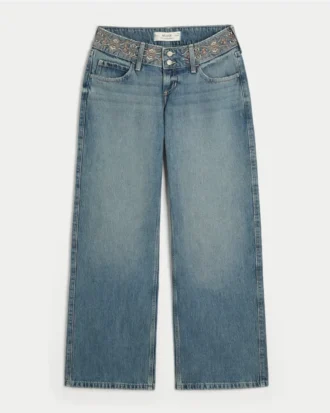 Vaqueros holgados con cintura bordada, lavado medio y talle ultra bajo Vaqueros holgados con cintura bordada, lavado medio y talle ultra bajo