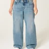 Vaqueros holgados de talle bajo y lavado medio con cintura ajustable Vaqueros holgados de talle bajo y lavado medio con cintura ajustable