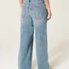 Vaqueros holgados de talle bajo y lavado medio con cintura ajustable Vaqueros holgados de talle bajo y lavado medio con cintura ajustable