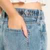 Vaqueros holgados de talle bajo y lavado medio con cintura ajustable Vaqueros holgados de talle bajo y lavado medio con cintura ajustable