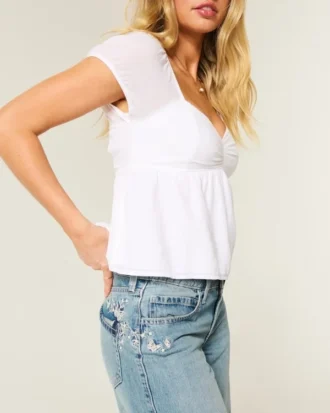 Vaqueros holgados de talle bajo y lavado medio con estampado de mariposas Vaqueros holgados de talle bajo y lavado medio con estampado de mariposas