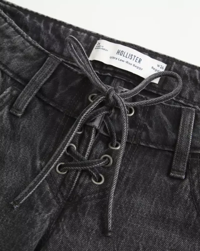 Vaqueros holgados lavados de talle ultra bajo con cordones negros Vaqueros holgados lavados de talle ultra bajo con cordones negros