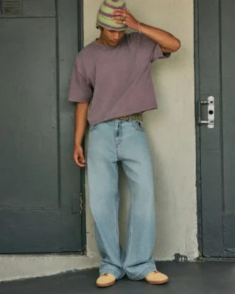 Vaqueros superbaggy con estampado de astronauta en lavado claro