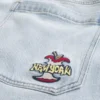 Vaqueros superbaggy con estampado de Nueva York en lavado claro