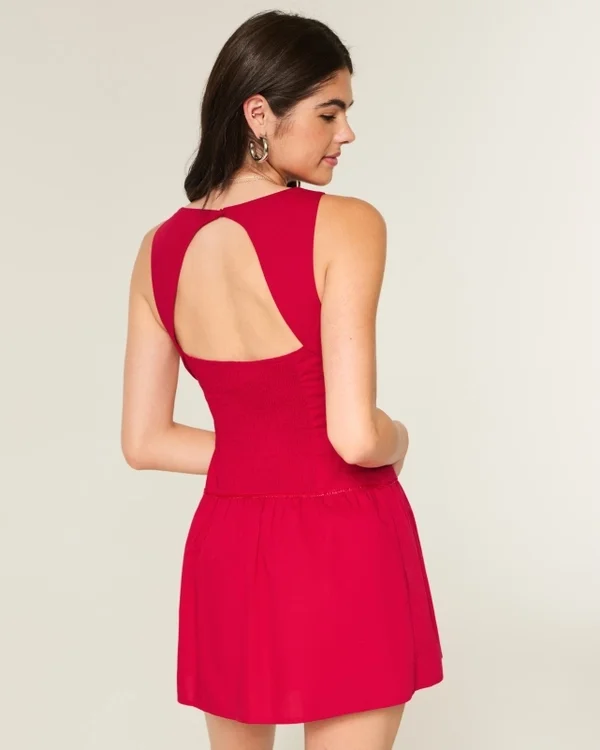 Vestido con falda pantalón, cuello alto y cintura baja Vestido con falda pantalón, cuello alto y cintura baja