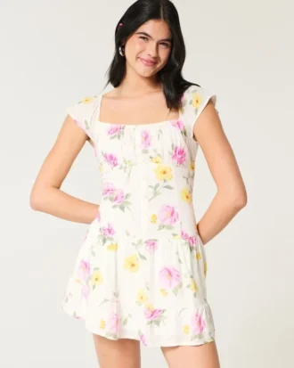 Vestido con falda pantalón y mangas con volantes Vestido con falda pantalón y mangas con volantes