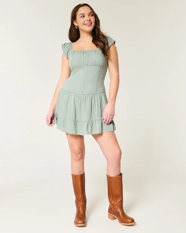 Vestido con falda pantalón y mangas con volantes Vestido con falda pantalón y mangas con volantes