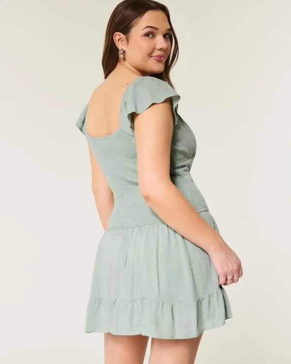 Vestido con falda pantalón y mangas con volantes Vestido con falda pantalón y mangas con volantes