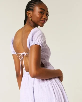 Vestido largo de manga corta con espalda abierta