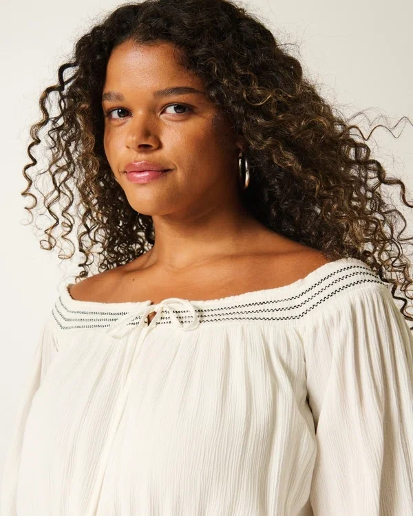 Vestido tejido con hombros al aire Vestido tejido con hombros al aire